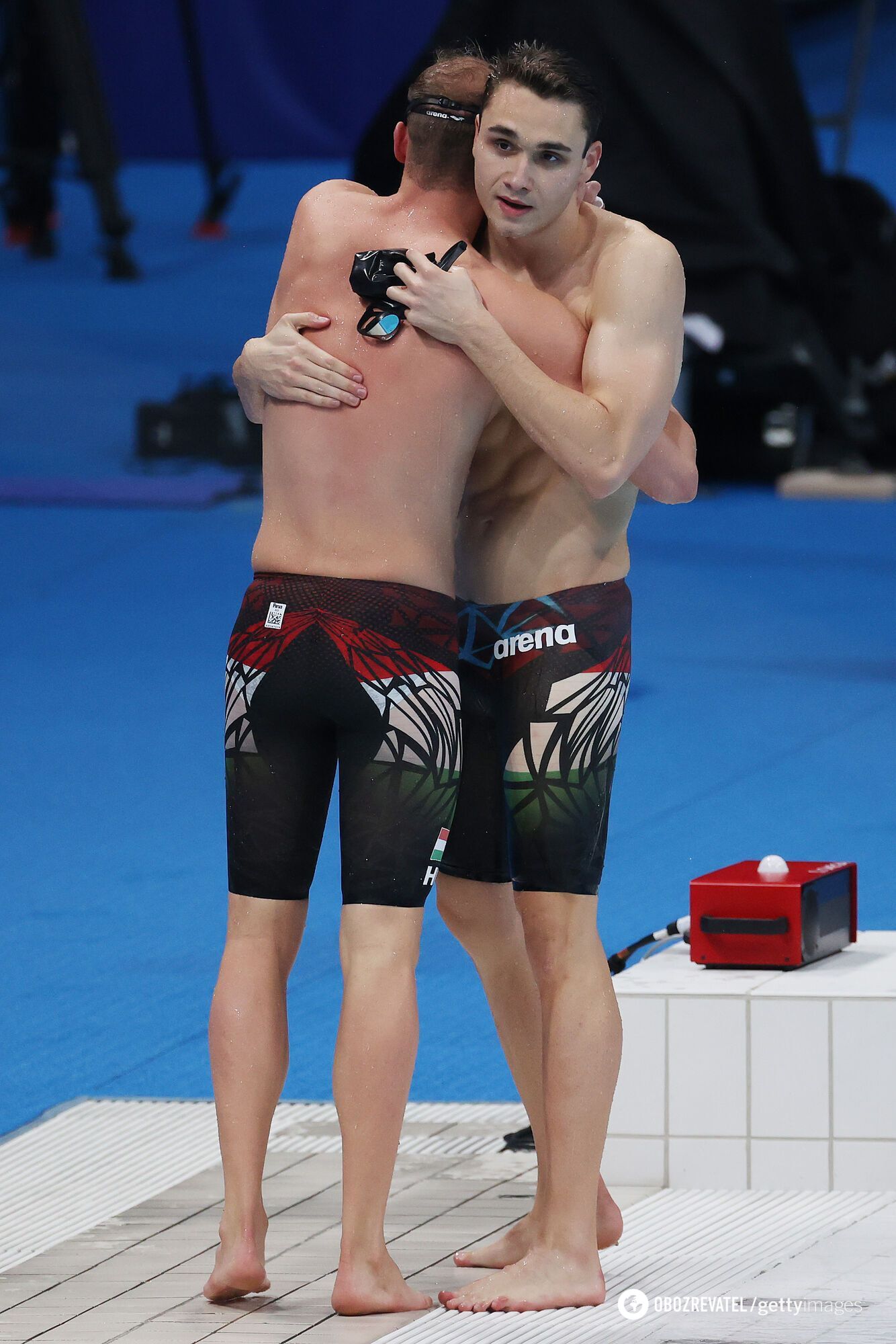 Кристоф Милак в соревновательных шортах (справа)