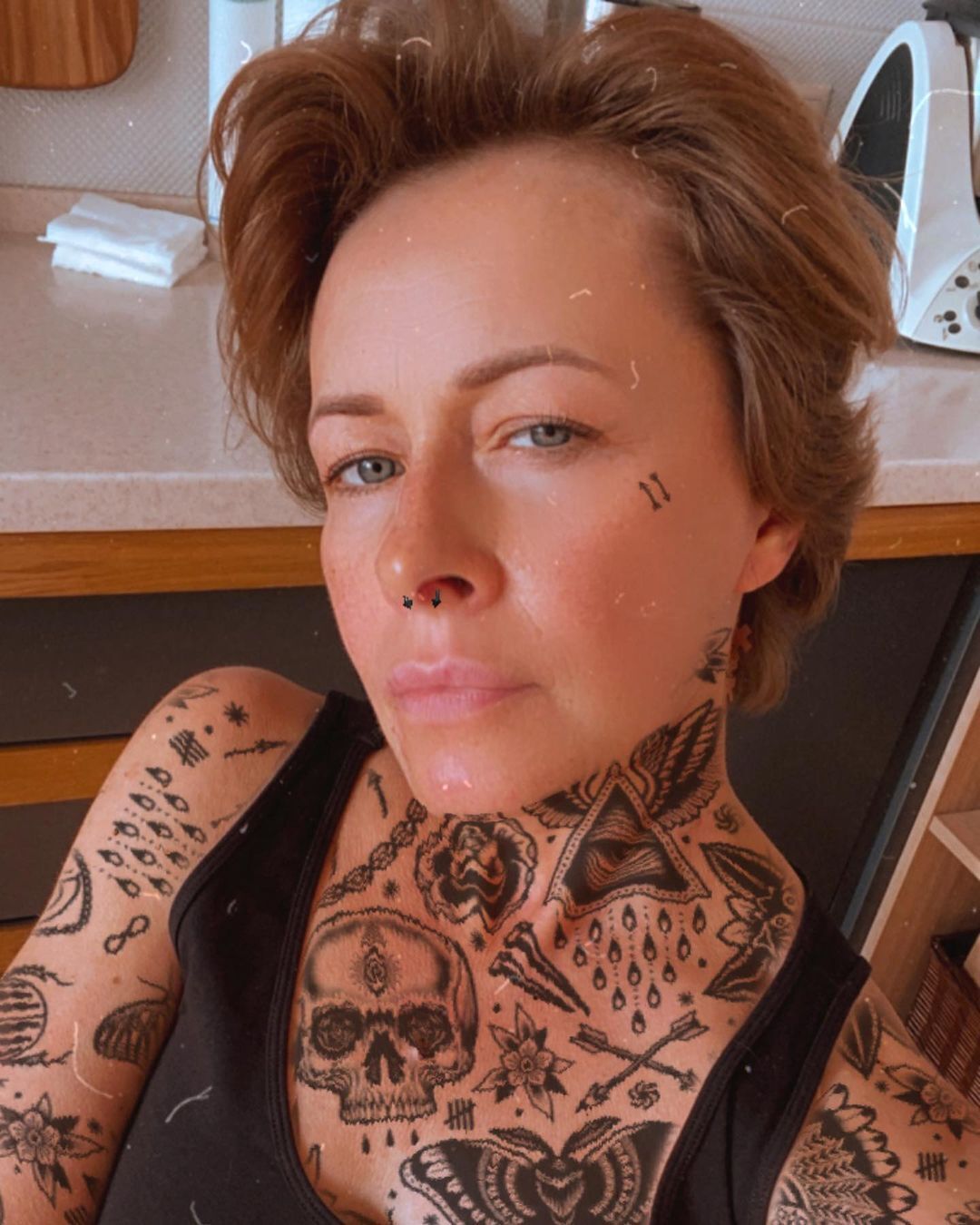Елена Кравец с татуировками