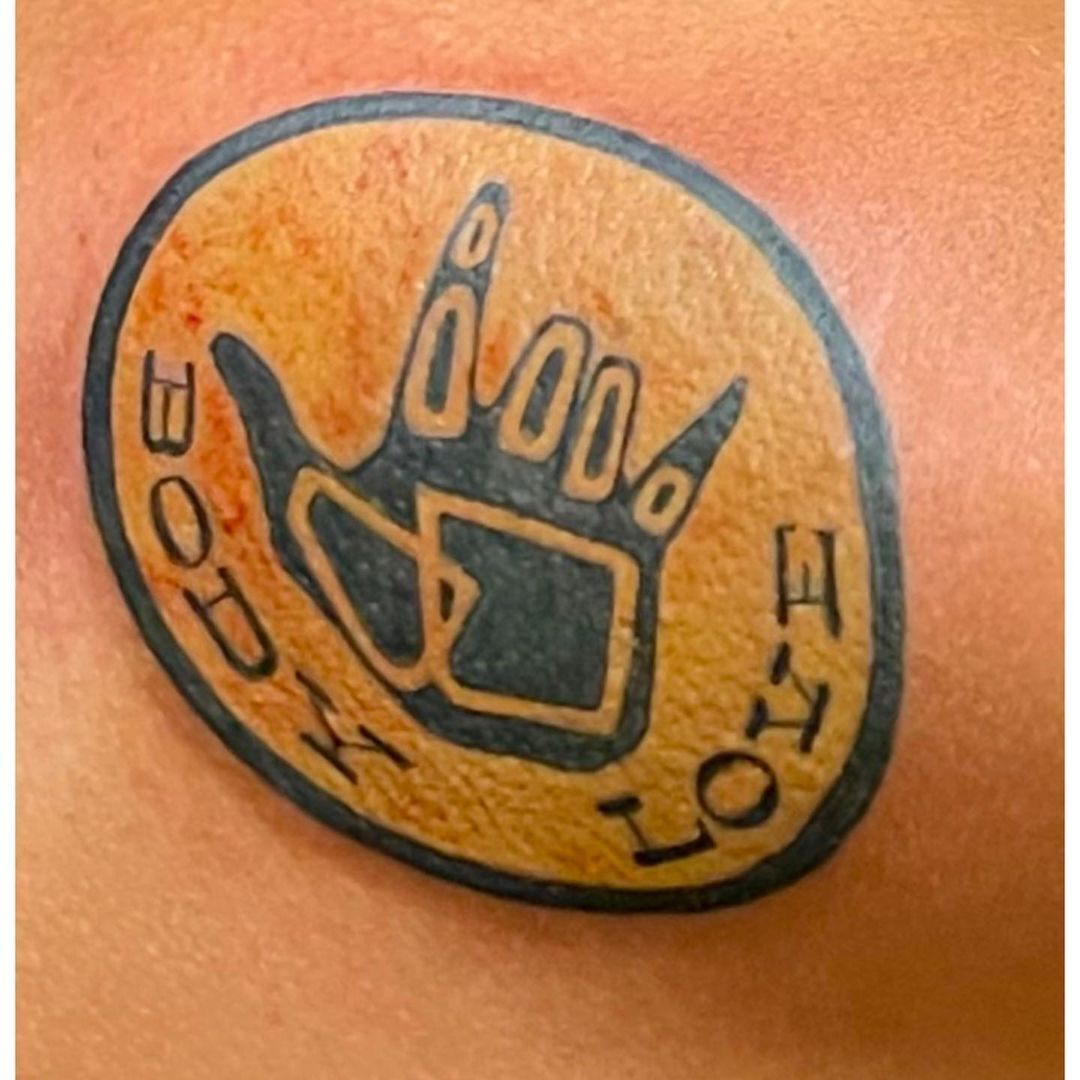 Татуювання Джона Гілла.
