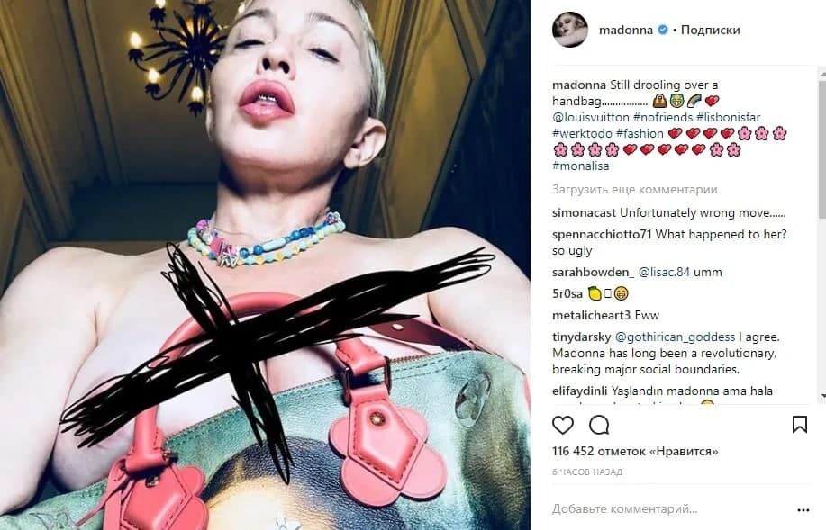 Мадонна появилась перед фанатами на фото с сумкой от Louis Vuitton, прикрыв голую грудь