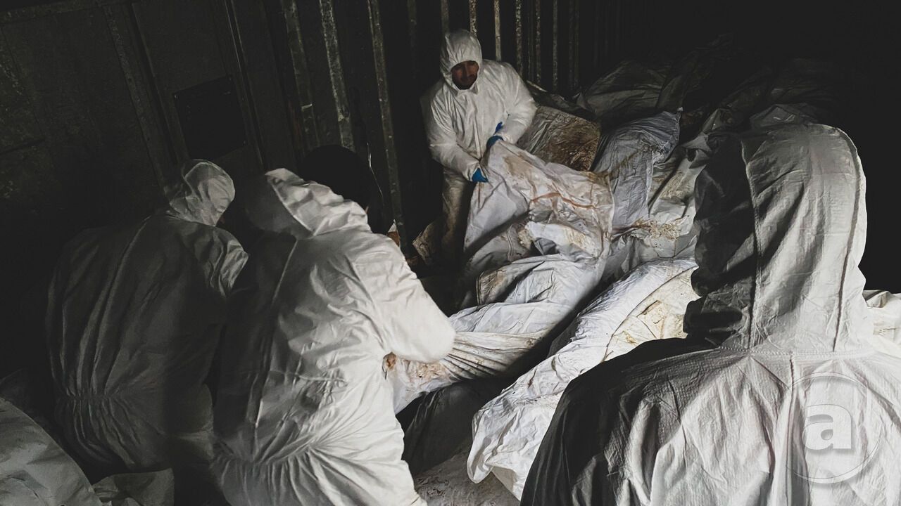 На Харківщині збирають тіла ліквідованих російських окупантів: частина з них заміновані. Фото 