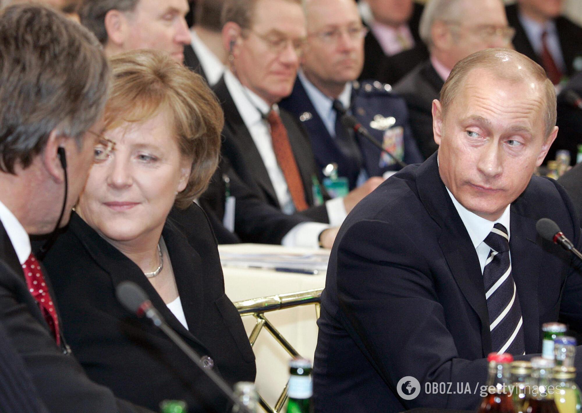 Віктор Ющенко, Ангела Меркель та Володимир Путін на Мюнхенській конференції