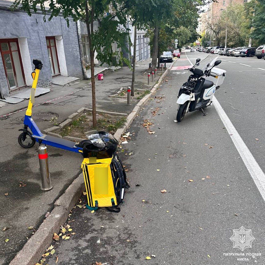 У Києві на пішохідному переході зіткнулись скутерист та чоловік на електросамокаті. Фото