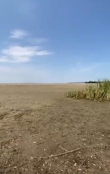 Вместо воды – огромная пустыня: в сети показали, что осталось на месте Каховского водохранилища. Видео