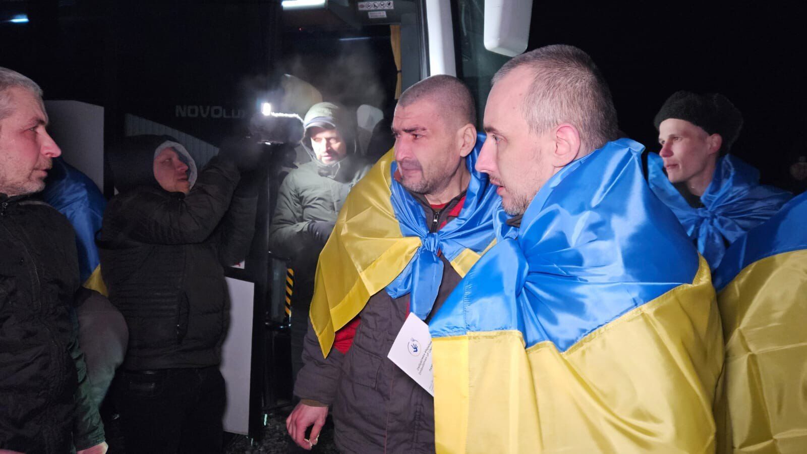 Захисники у прапорах України