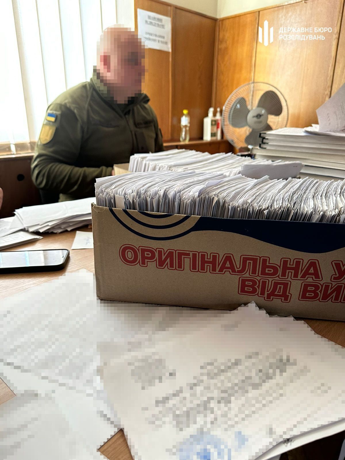 Серед клієнтів – банкіри з синами: ексначальник військкомату Київщини організував  схему ухилення від мобілізації. Фото