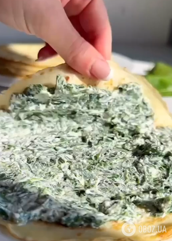 Ситні тонкі млинці з сиром та шпинатом: готуються в духовці