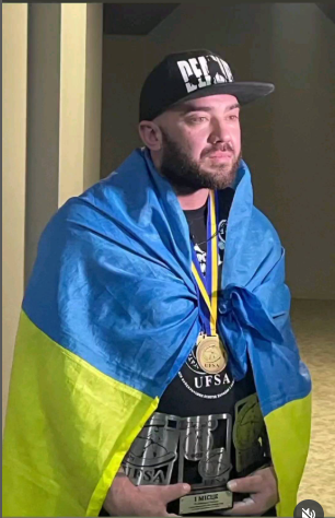 Павел Ищенко с медалью