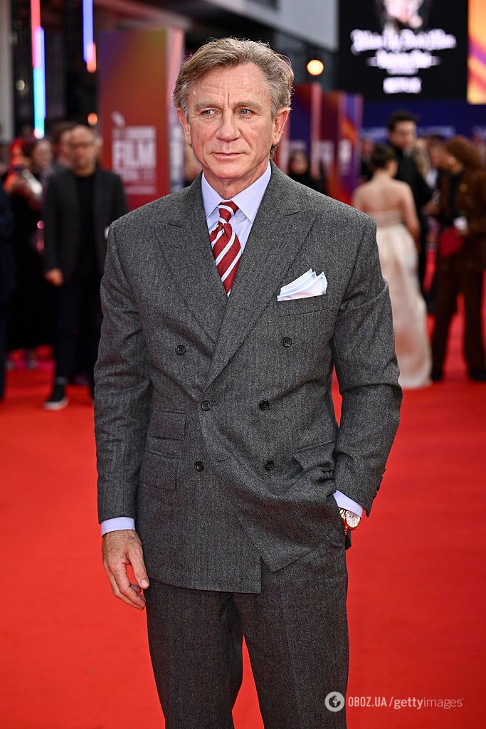 57-річний Деніел Крейг уперше за рік вийшов на червону доріжку з красунею-дружиною. Фото