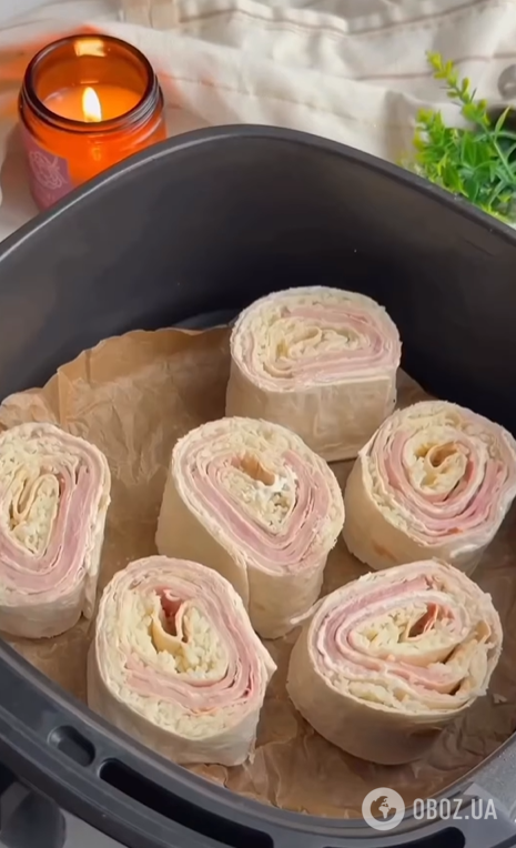 Ленивые рулетики из лаваша с ветчиной и твердым сыром: готовятся за считанные минуты