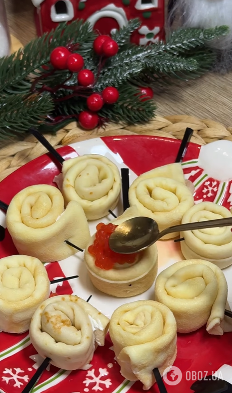 Вместо привычных бутербродов: как приготовить изысканную закуску из блинов с красной икрой