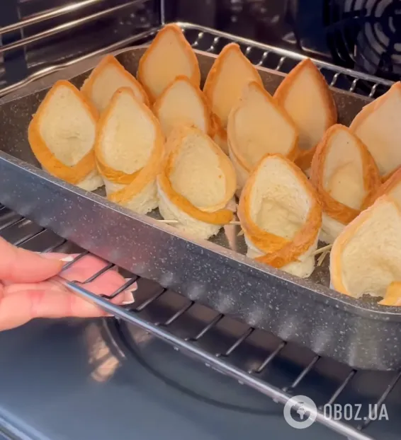 Бутерброды со шпротами по-новому: рецепт быстрой закуски для новогоднего стола