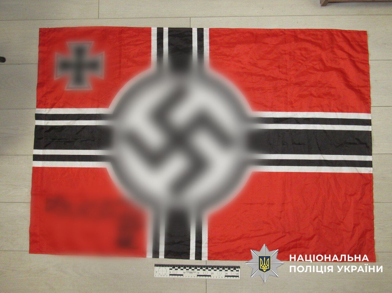 Публиковала снимки с нацистской символикой: полицейские сообщили о подозрении секретарю райсуда Киева. Фото