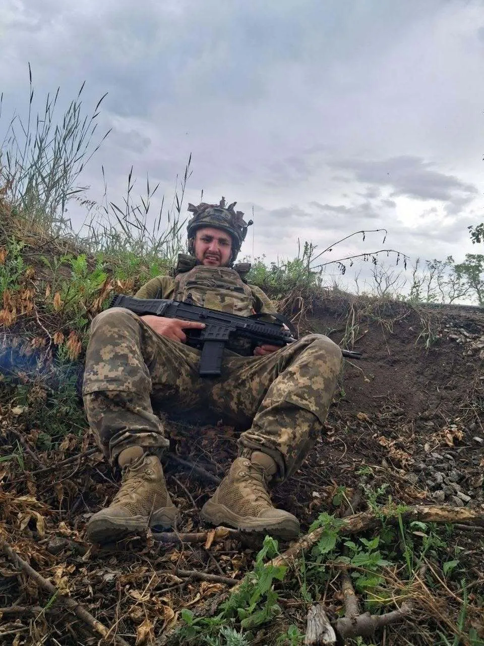 Роман Бузіле