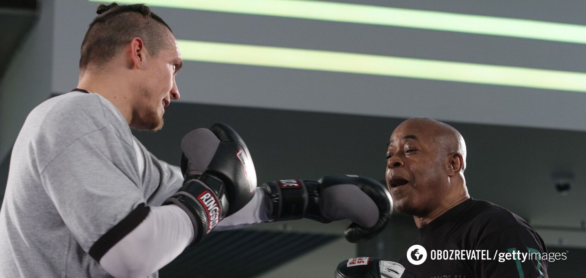 Александр Усик и Джеймс Али Башир