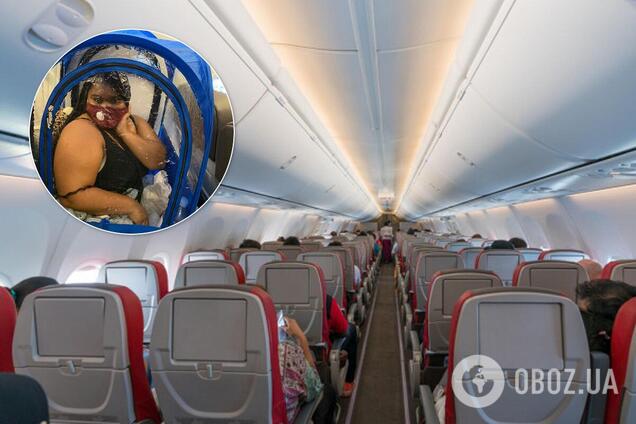 Пассажирка разбила в самолете палатку из-за коронавируса. Фото