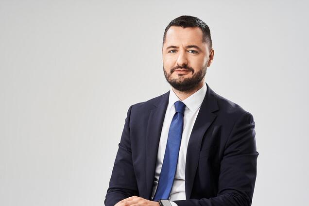 Роман Опимах