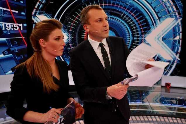 Российские телеведущие Ольга Скабеева и Евгений Попов