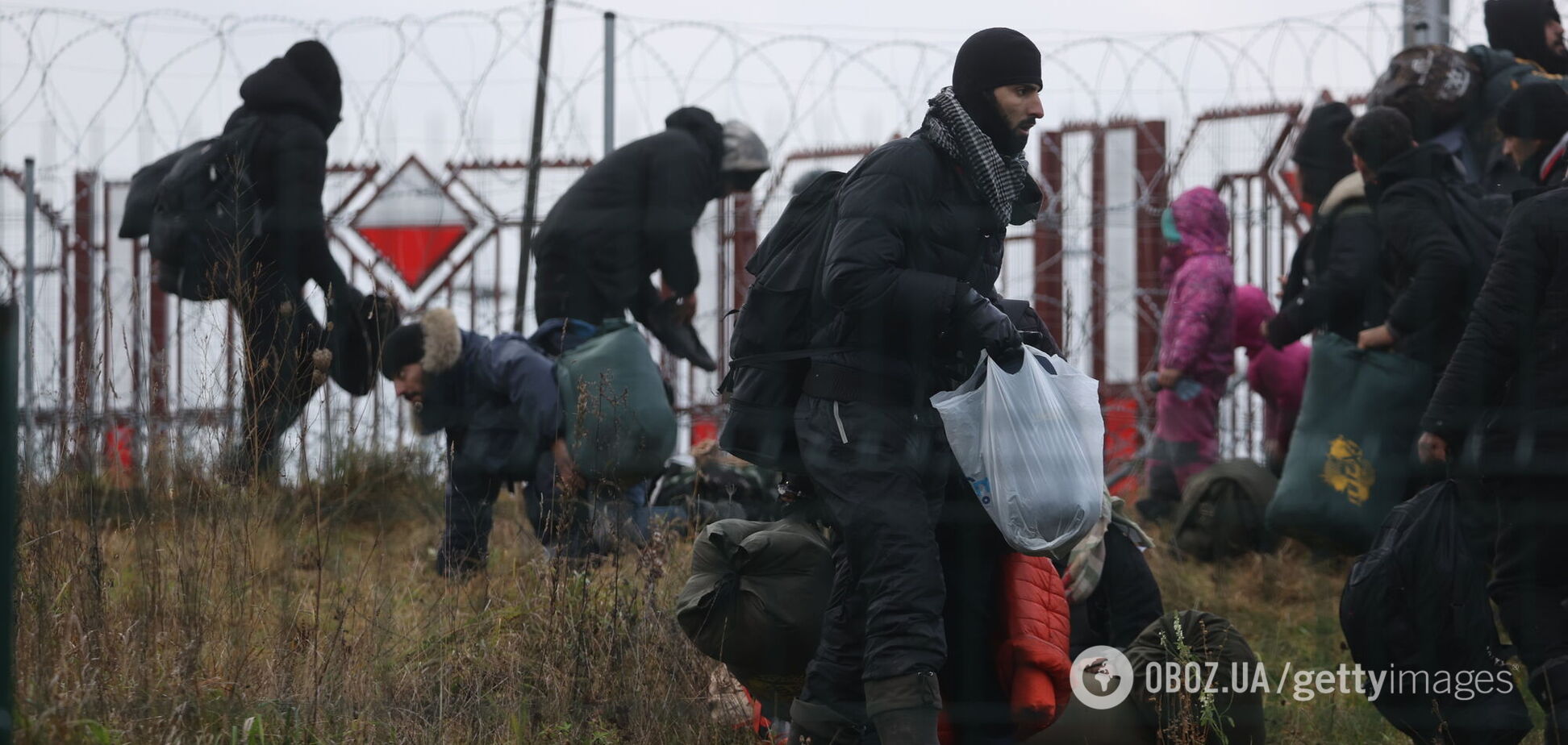 Миграционный кризис между Беларусью и Польшей: большинство опрошенных украинцев не хотят принимать беженцев