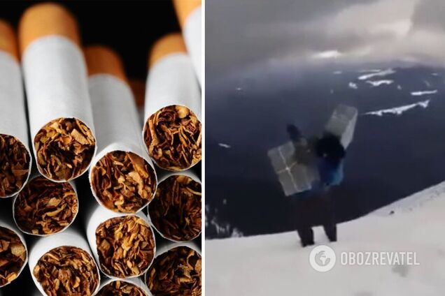 Українські контрабандисти контрабандисти переносять цигарки через гору в Румунію