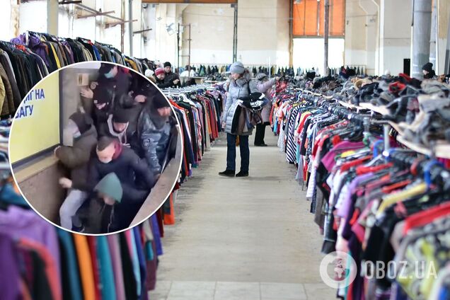 В Полтаве охранник своей 'пятой точкой' сдерживал толпу, штурмующую секонд-хенд. Курьезное видео 18+