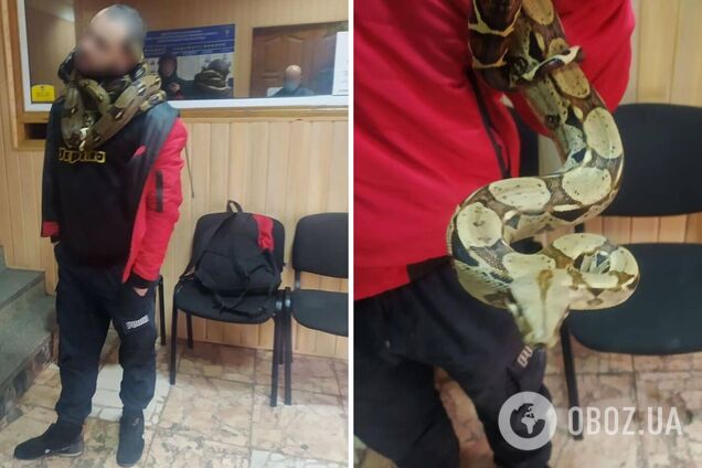 В Киеве мужчина ходил со змеями на шее