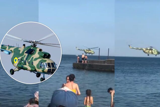 В Одессе военный вертолет пролетел прямо над головами отдыхающих на пляже. Видео 'высшего пилотажа'