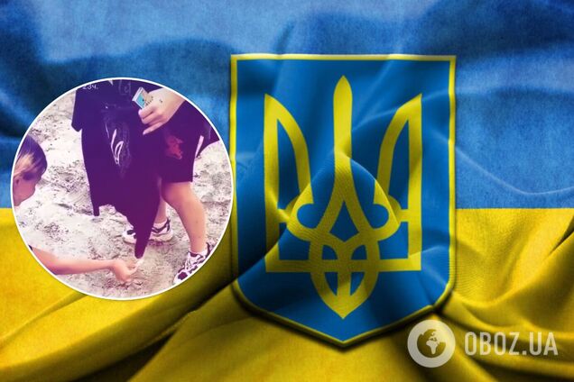 Дівчата спалили футболку з гербом України і нарвалися на скандал. Відео