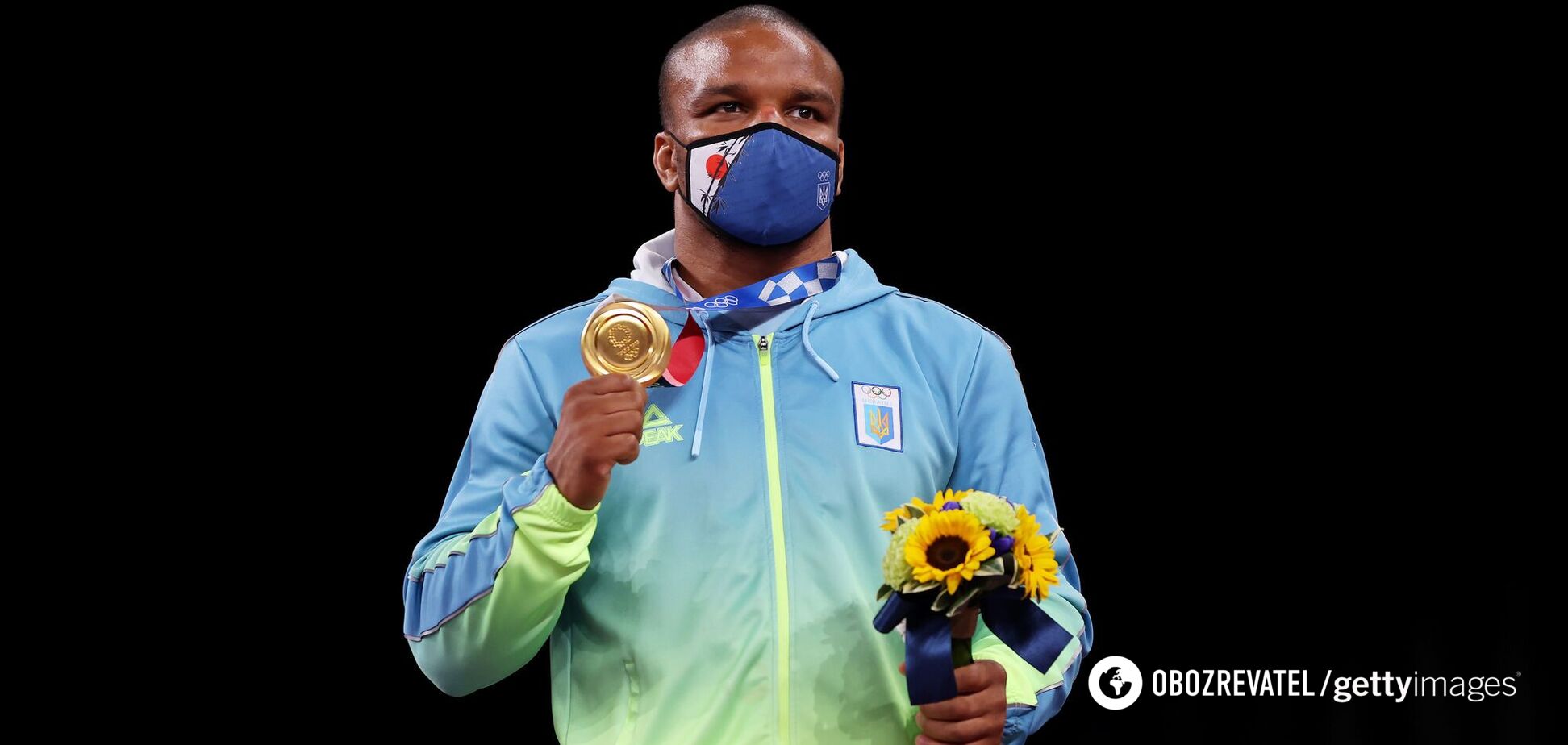 Жан Беленюк із медаллю