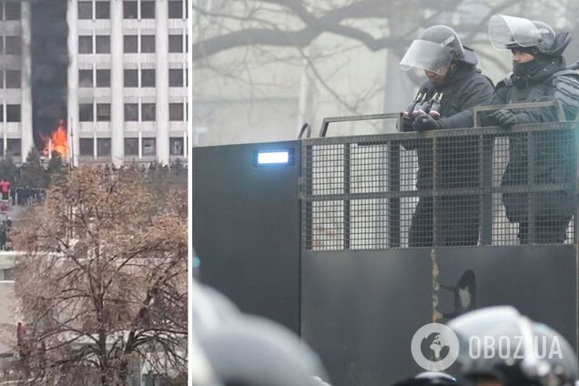 Над зданием поднимается черный дым