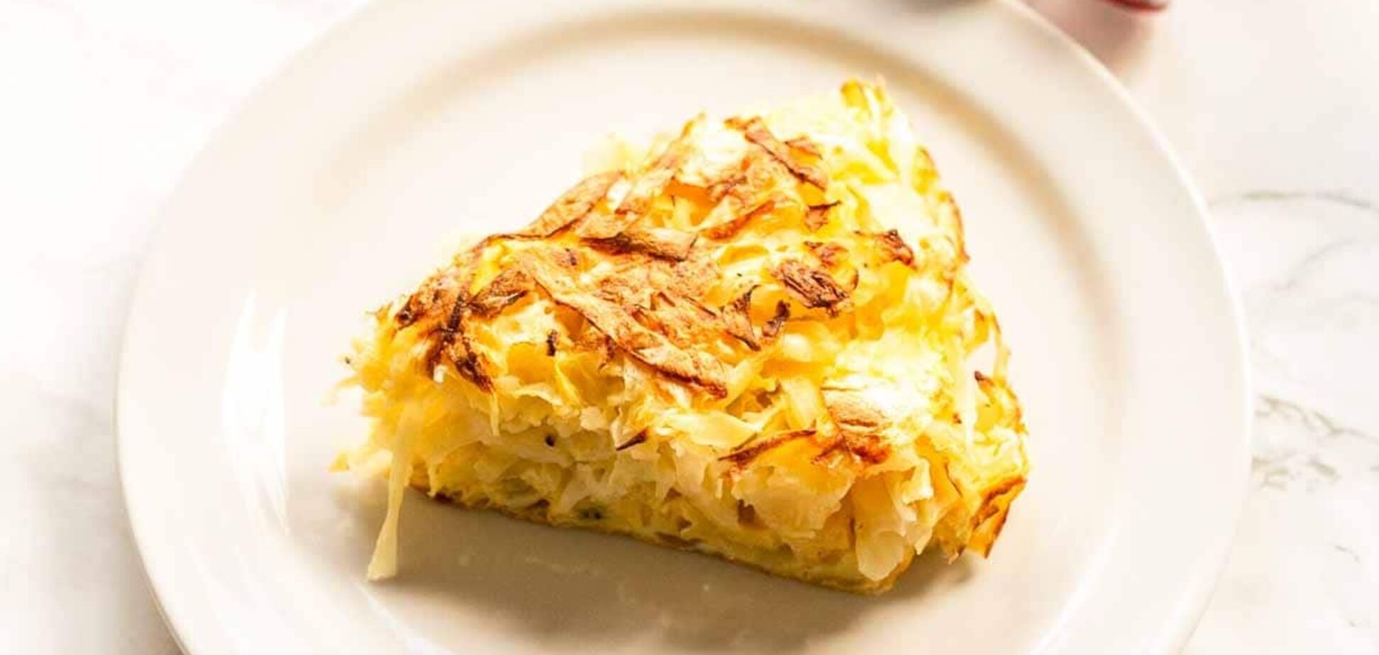 Лінивий капустяний пиріг на сковорідці: випікати не доведеться 