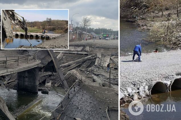 На месте взорванного моста в Ирпене насыпали временную переправу. Фото