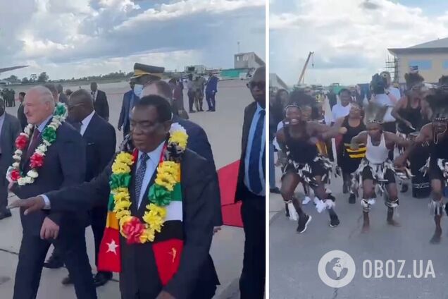 Лукашенко приехал в Зимбабве: в аэропорту встретили танцами и надели венок. Видео