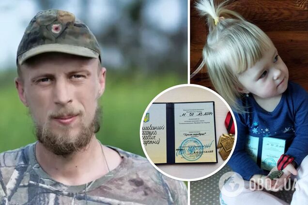 Маленькая дочь погибшего в Украине добровольца из Беларуси получила 'Крест храбрых' от Залужного. Фото