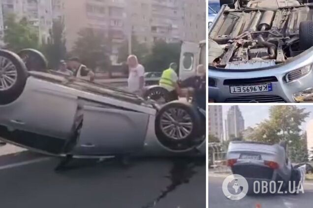 Карколомна аварія у Києві: автомобіль врізався у відбійник і перекинувся. Відео
