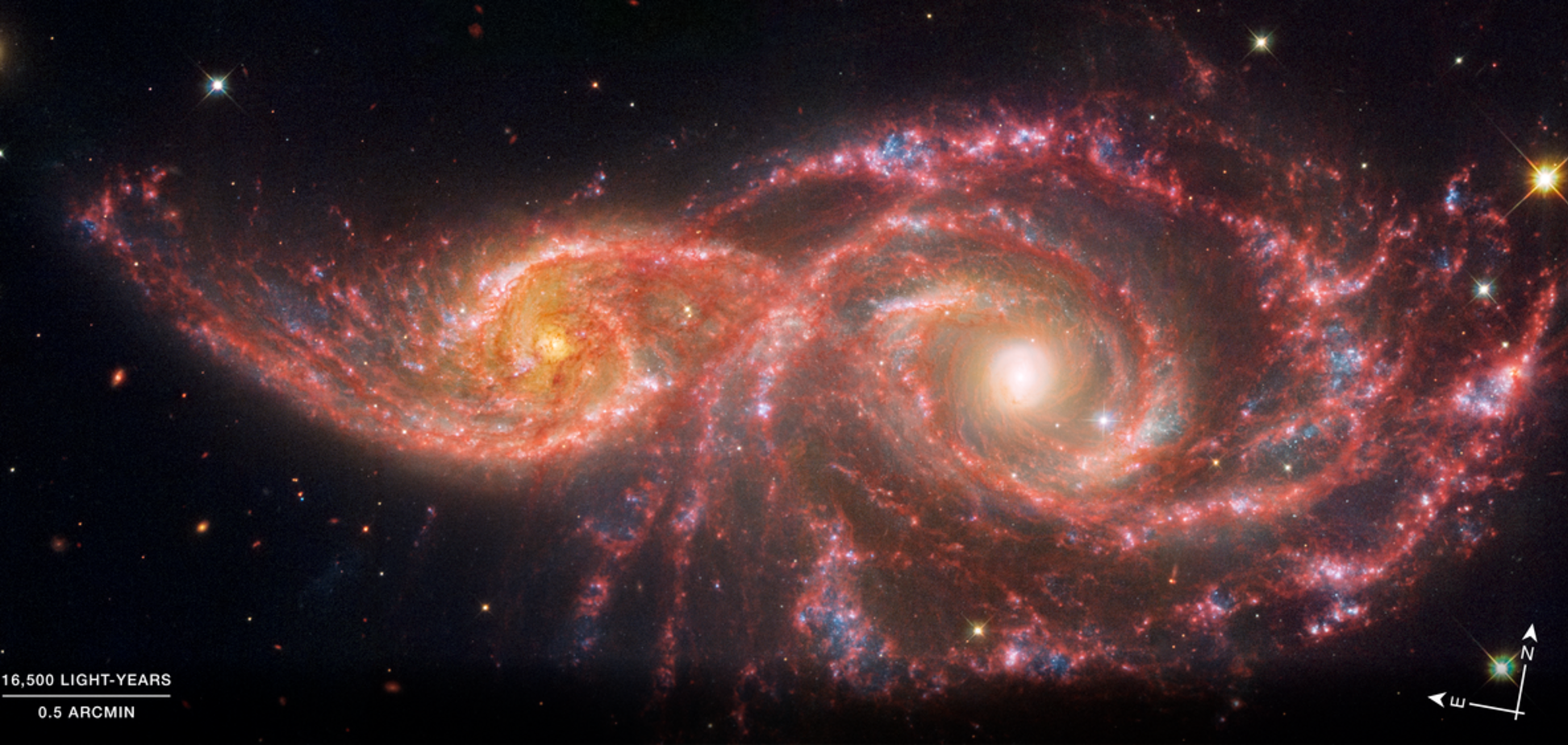 Как пара залитых кровью глаз: NASA зафиксировало слияние галактик. Фото и видео