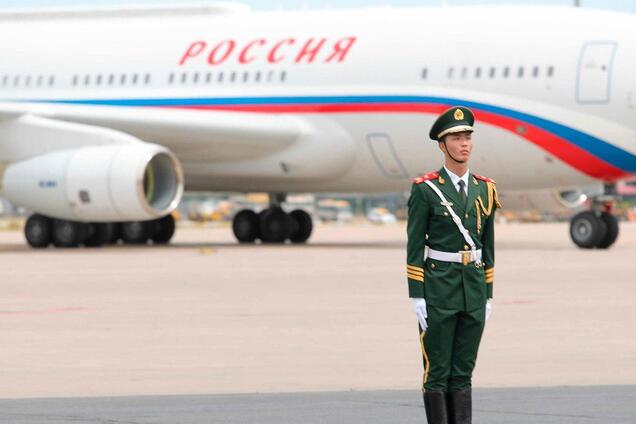 Путін прилетів у Китай: що відомо про мету і програму візиту. Відео
