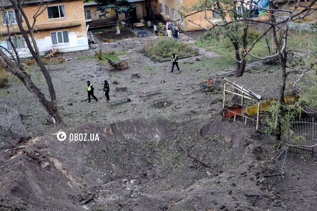 Величезна вирва біля дитсадка та пошкоджені будинки: наслідки атаки РФ у Дніпровському районі Києва. Фото та відео