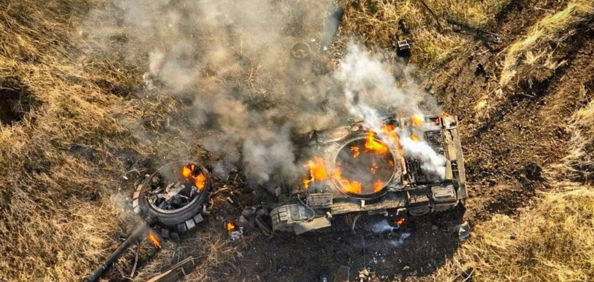 российский танк горит