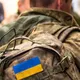 Иллюстративное фото. Украинский военнослужащий с портфелем в форме