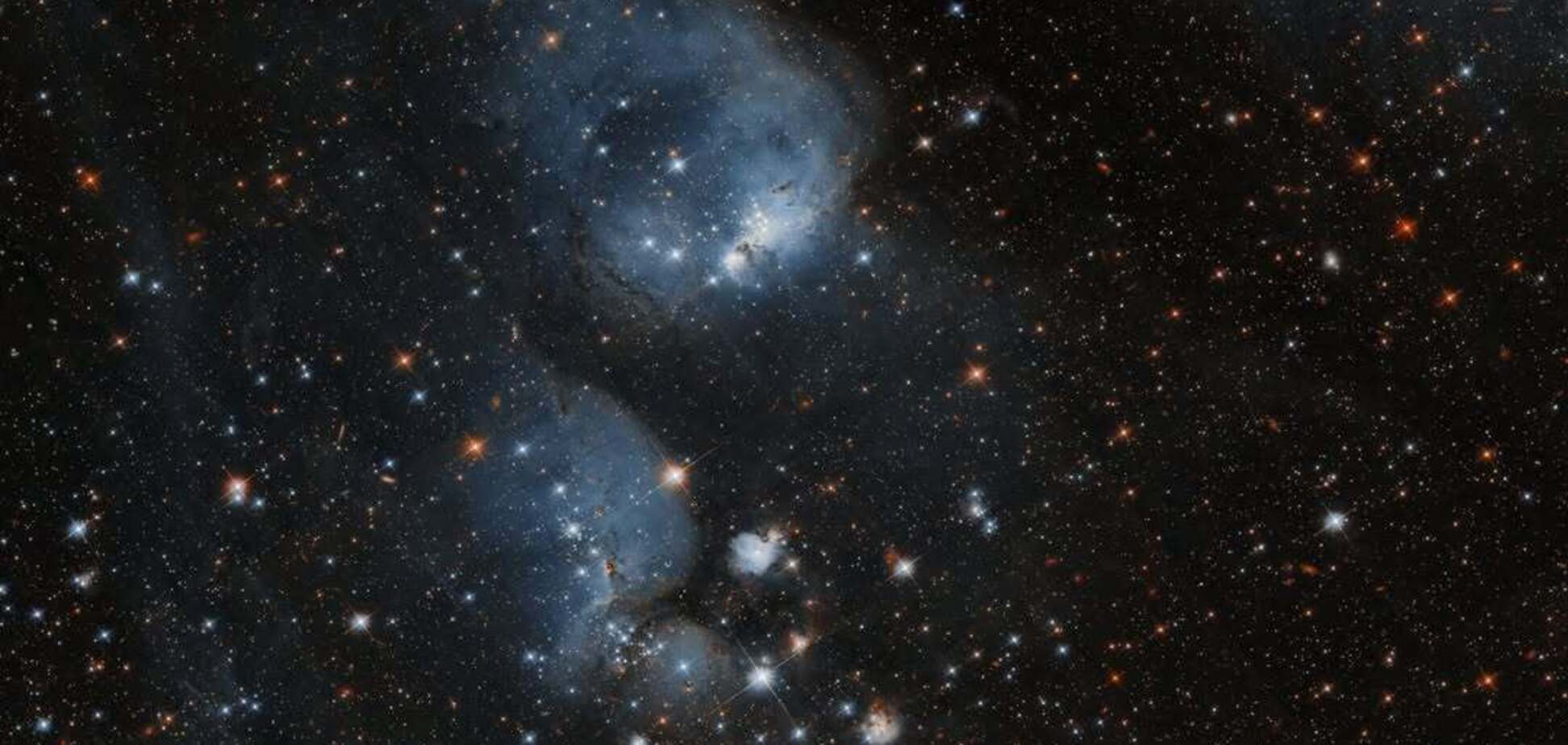 Телескоп Hubble заметил коконы, образующие звезды в соседней галактике