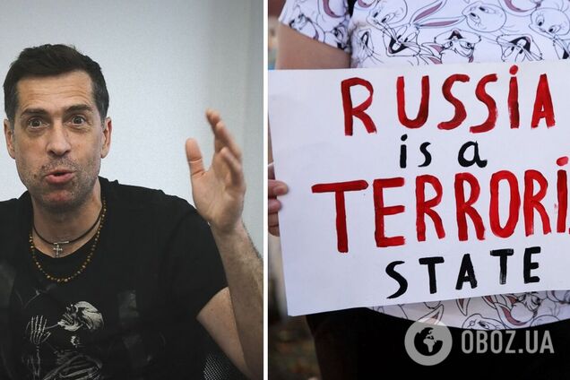 Солист 'Ногу свело!' Покровский с украинским флагом вышел на митинг в США и пригрозил американцам 'Россией №2'