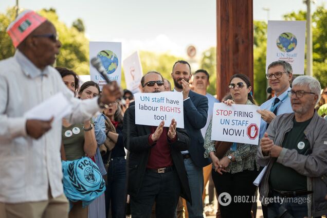 'Мы не являемся товаром!' В Женеве сотни сотрудников ООН вышли на протест. Фото