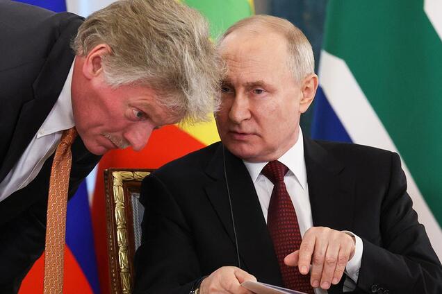 Дмитро Пєсков і Володимир Путін