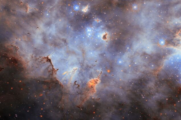 Телескоп Hubble показал 'звездные ясли' в соседней галактике. Фото