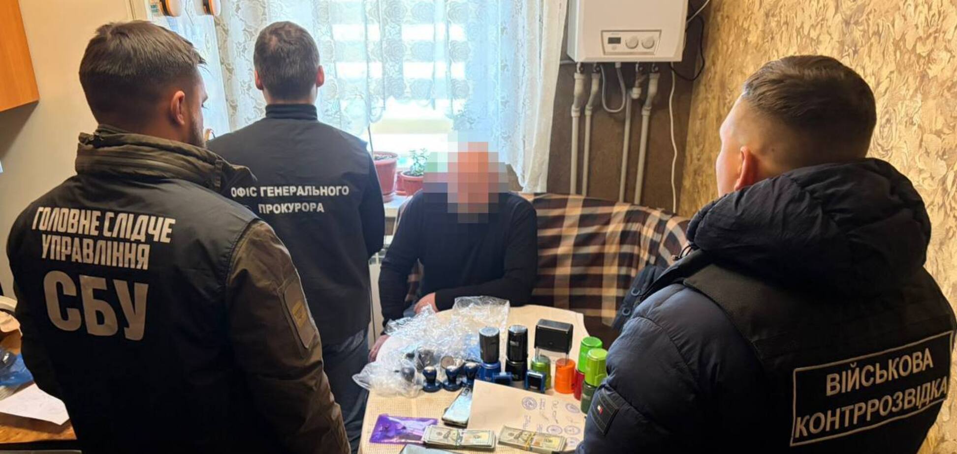 Организовал схему уклонения от мобилизации: СБУ разоблачила чиновника Киевской РГА и его сообщников. Фото