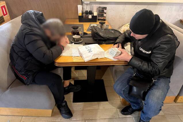 Инсценировал убийство на охоте и требовал почти $500 тыс. у бизнесмена: в Киеве задержали злоумышленника. Фото