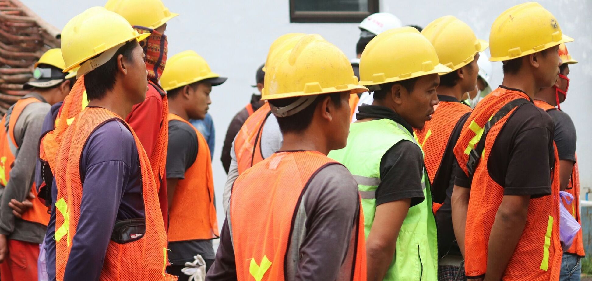 Ілюстрація - мігранти працівники