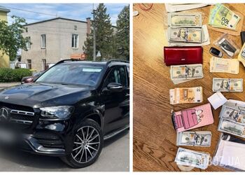 Во время обысков у топ-чиновников Нацполиции изъяли элитный автопарк, оружие и более 22 млн наличных. Фото